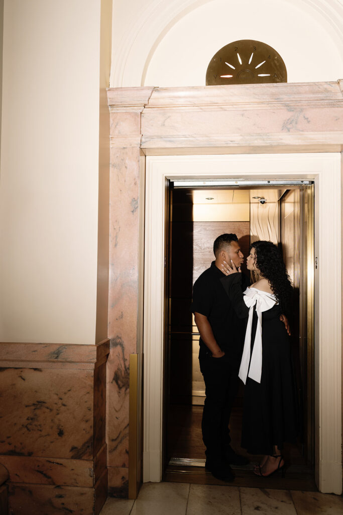 cute picture of the couple kissing during their engagement session