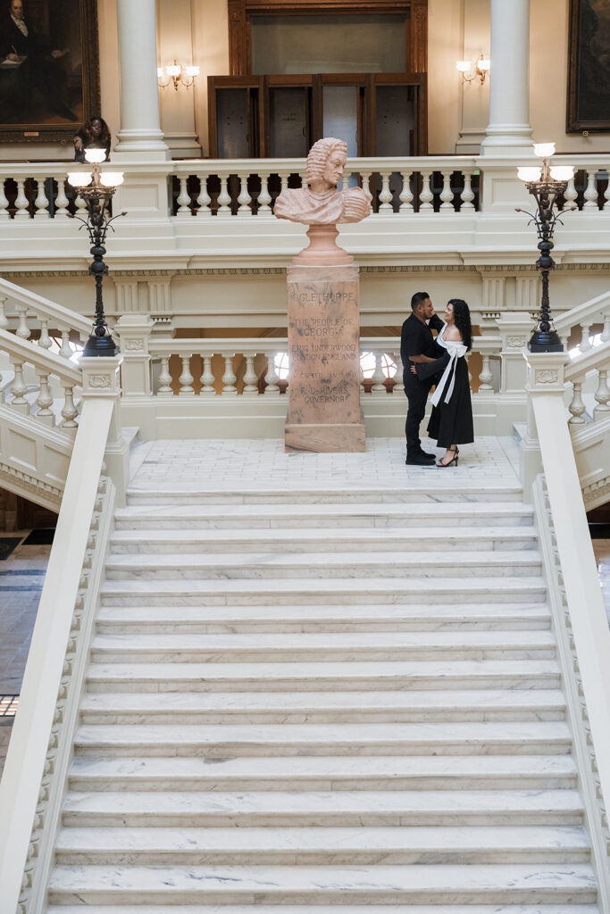 couple smiling at the camera during their session