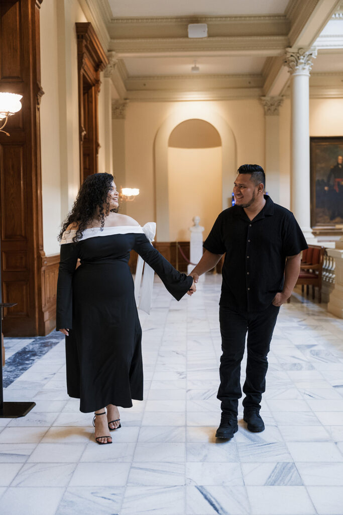 couple walking around their engagement location