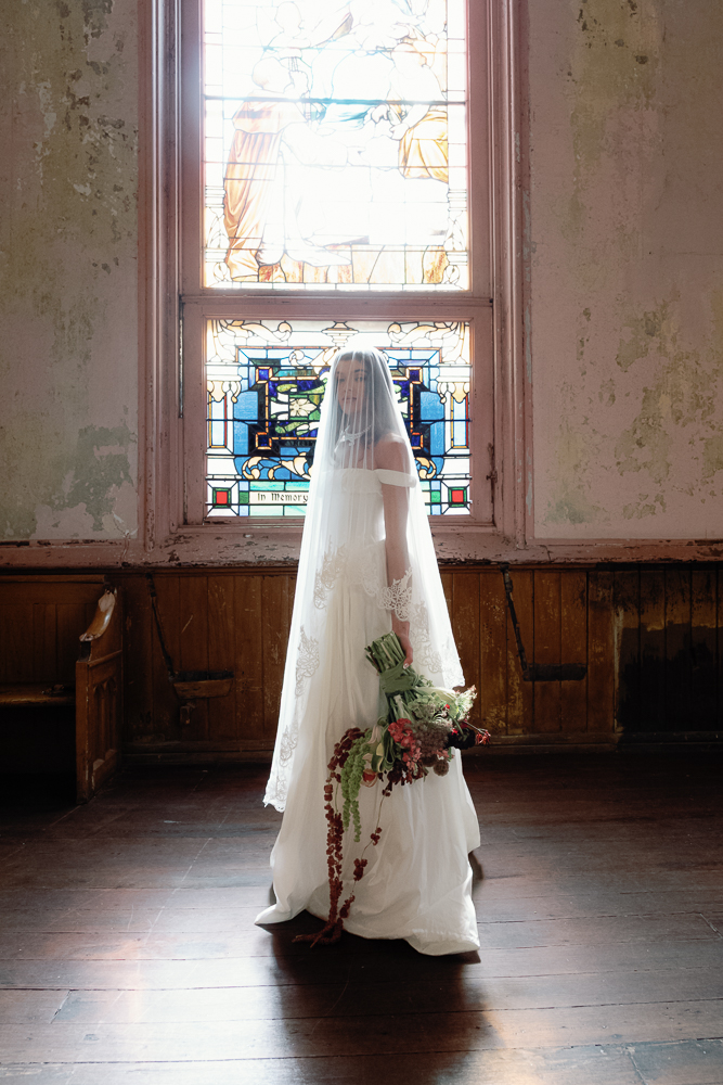 cute picture of the bride with her veil