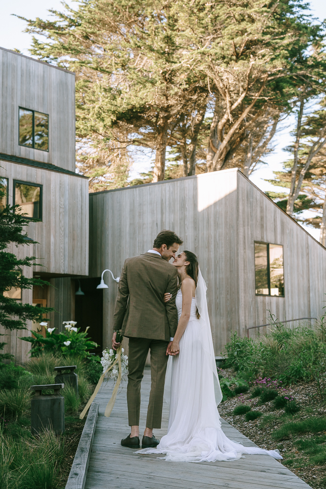 cute picture of the bride and groom kissing