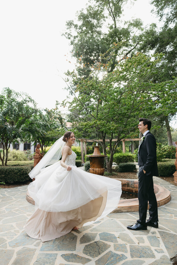 portrait of the newlyweds dancing during their photoshoot