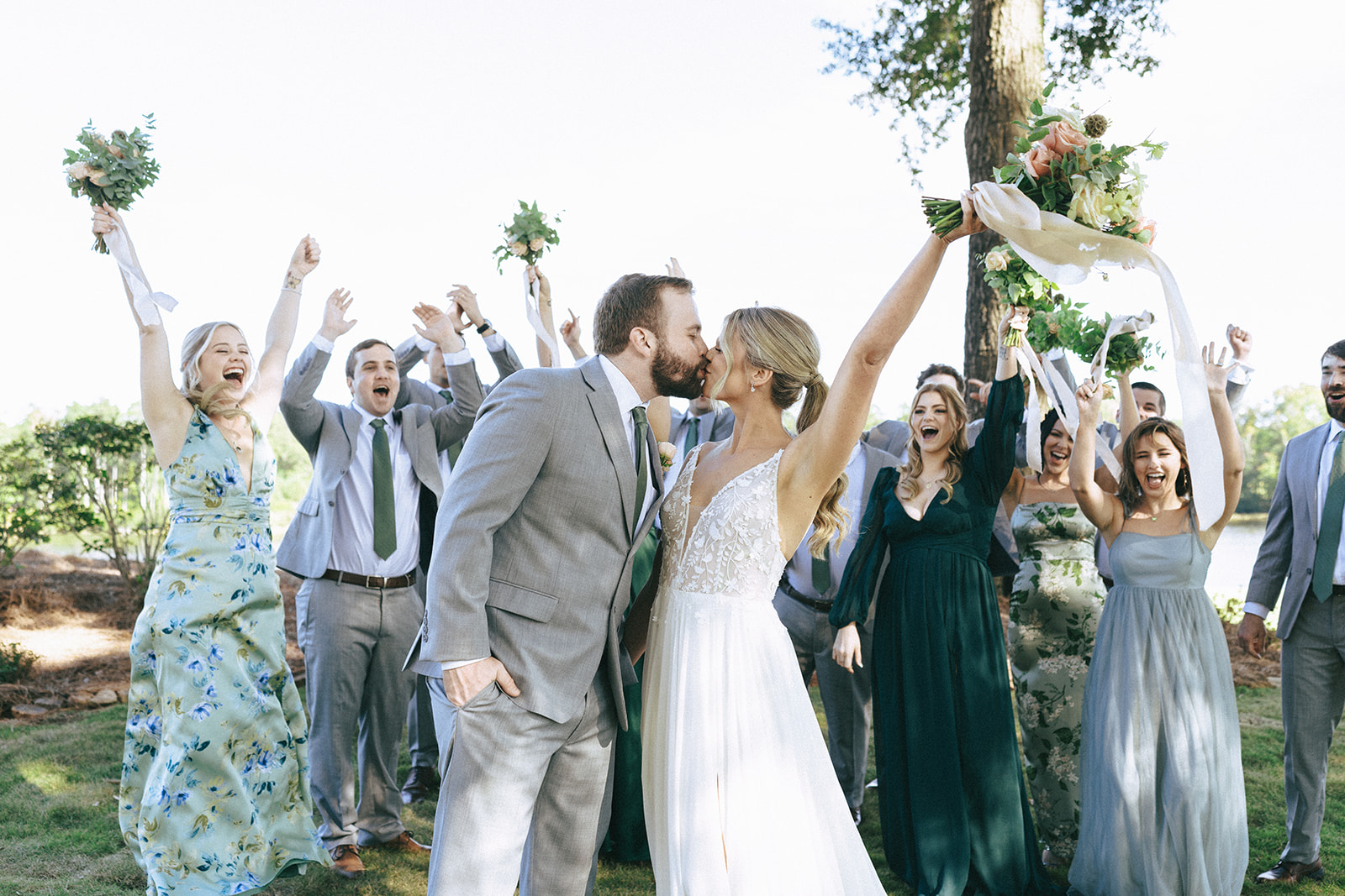 Picture of the bride and groom with their bridesmaids and groomsmen