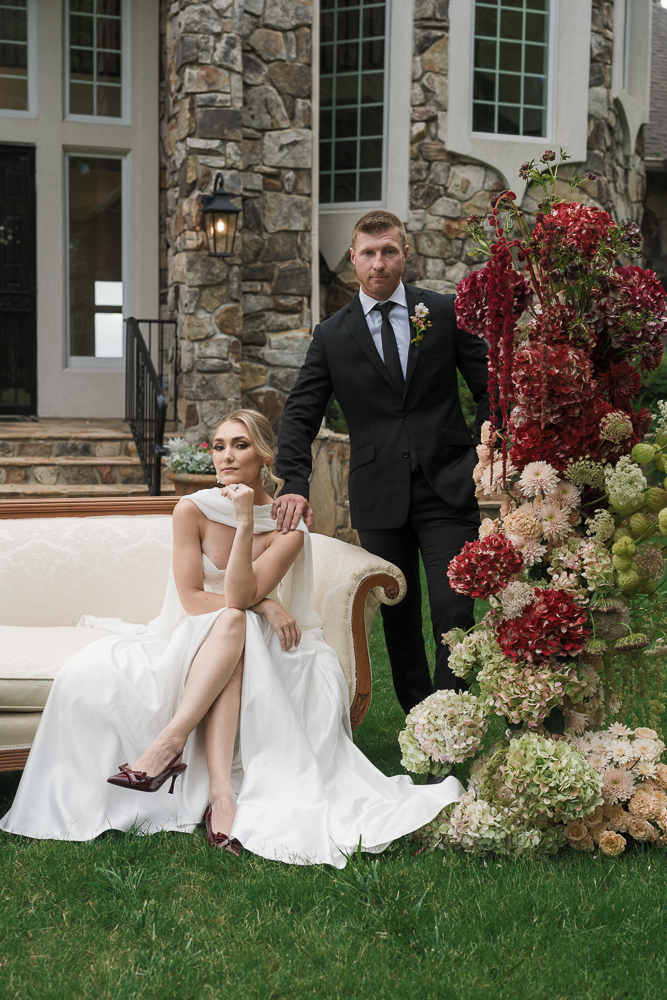 cute couple posing for the camera during their bridal portraits 