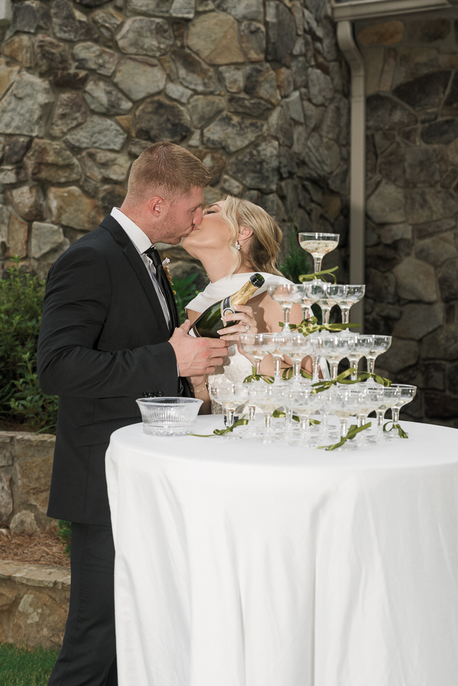 cute couple celebrating their wedding with champagne 