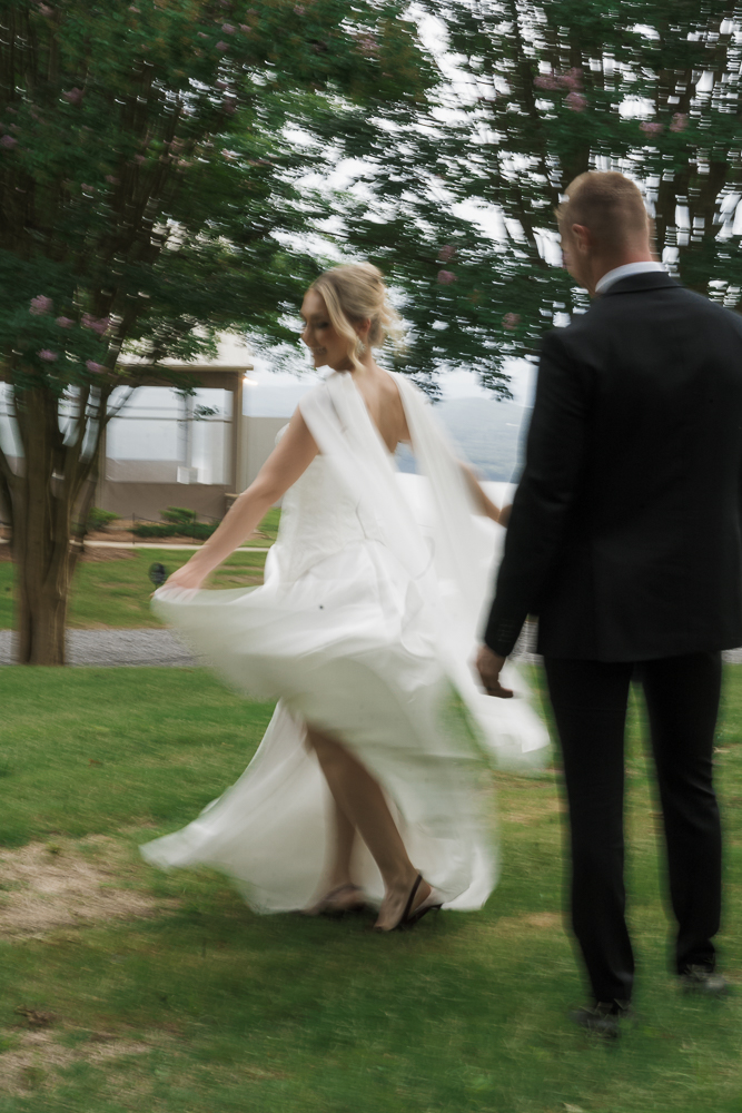bride and groom dancing during their photoshoot