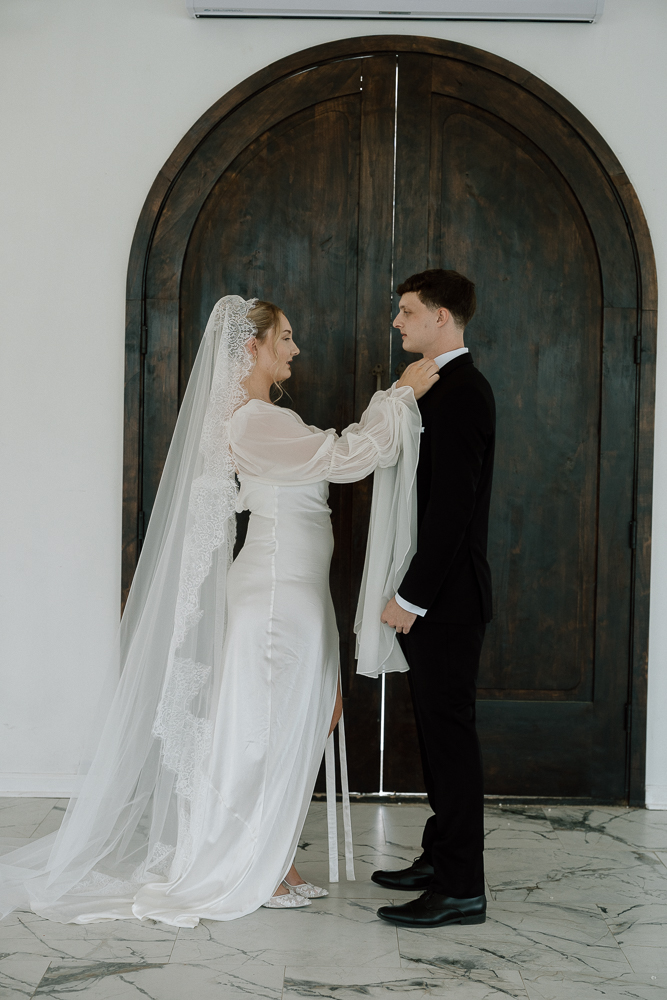 picture of the bride and groom before their ceremony