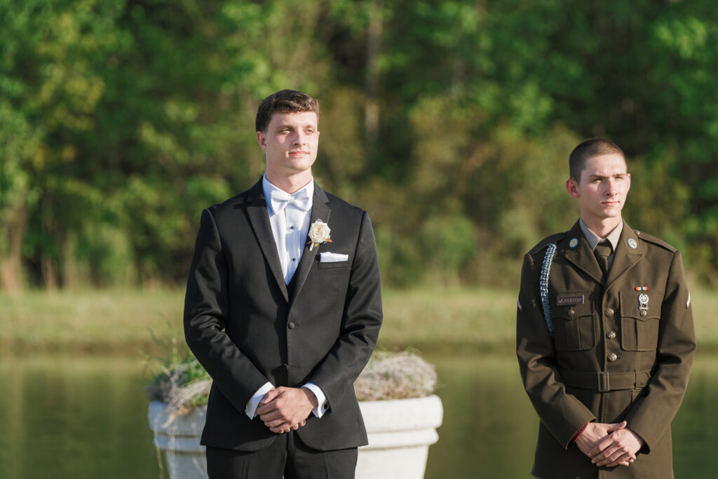 Groom, watching the bride walk down the aisle