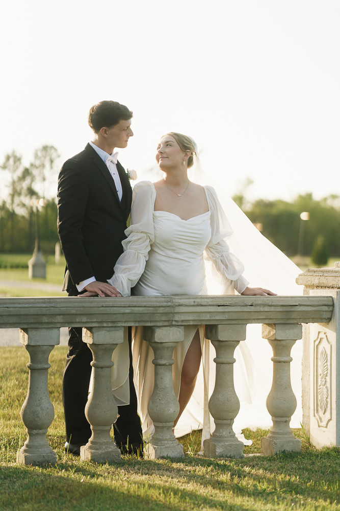 picture of the newlyweds smiling at each other