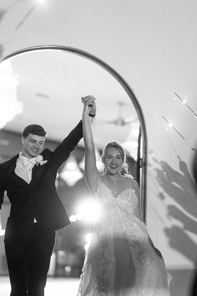 happy couple after their reception party
