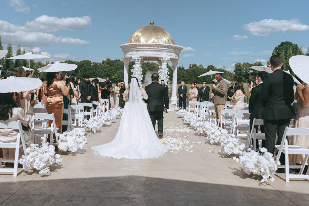 cute picture of the bride walking down the aisle 