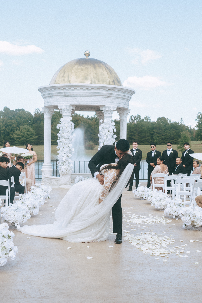 cute picture of the newlyweds kissing