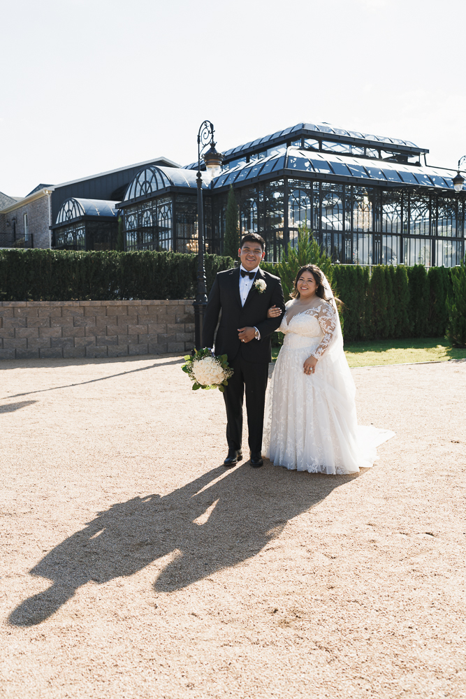 bride and groom posing for the camera during their bridal session