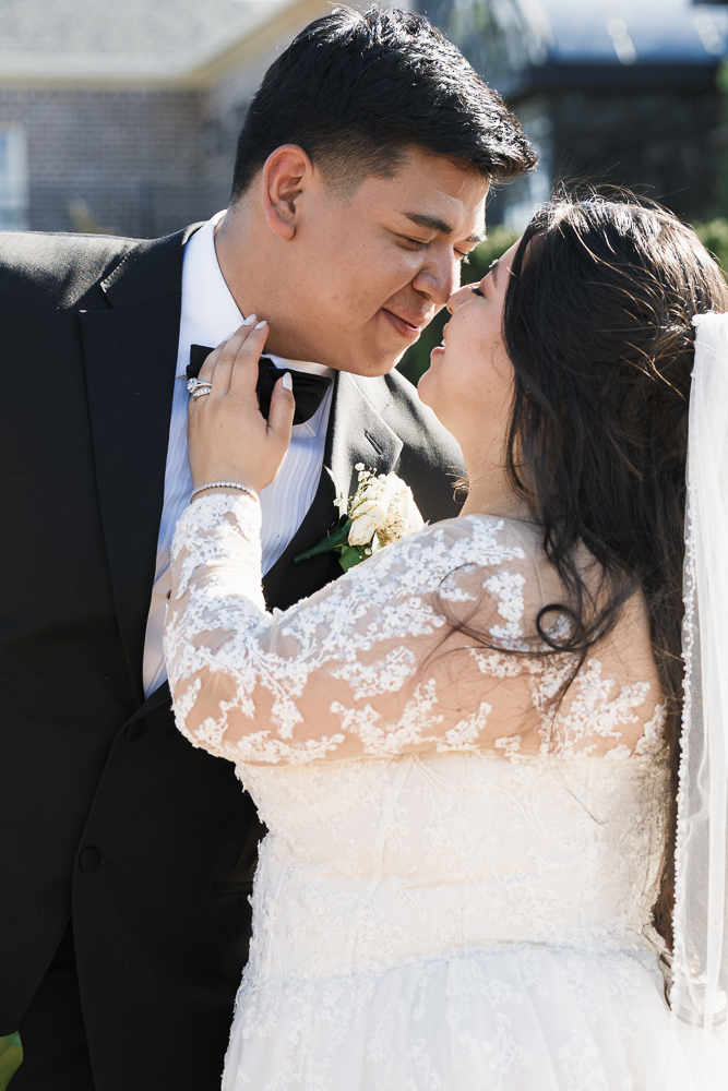 cute picture of the newlyweds kissing