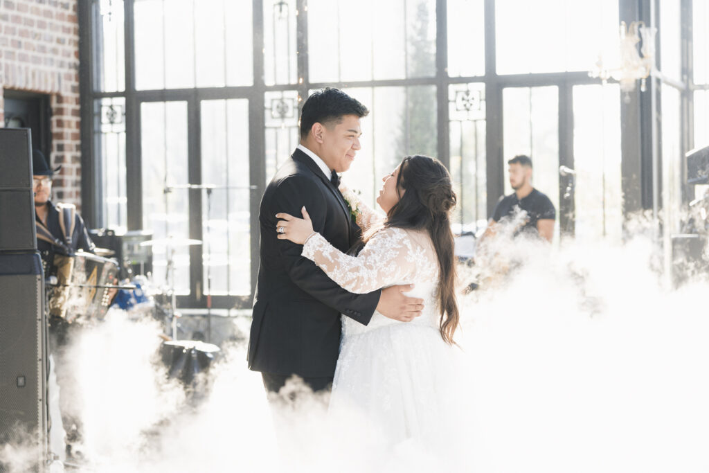 bride and groom dancing at their wedding reception party