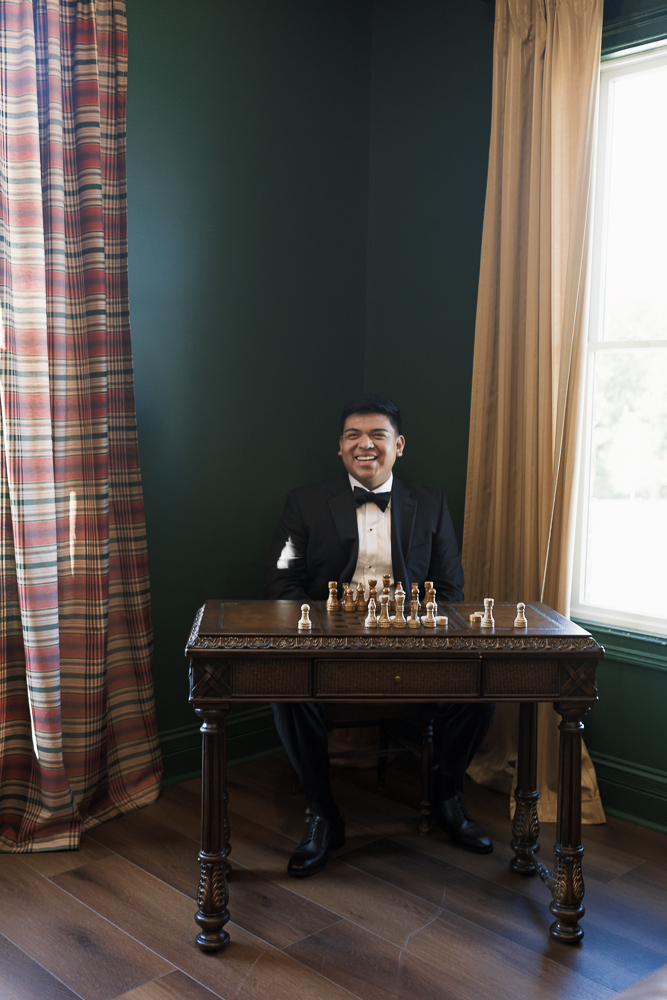 portrait of the groom before heading to his first look with the bride