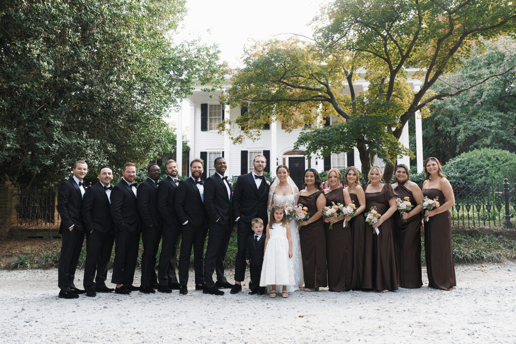 Picture of the bride and groom with their bridal parties
