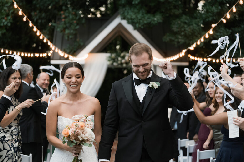 Couple heading to their wedding reception