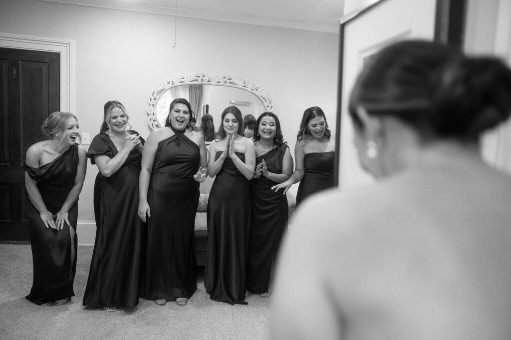 First look of the bride and her bridesmaids