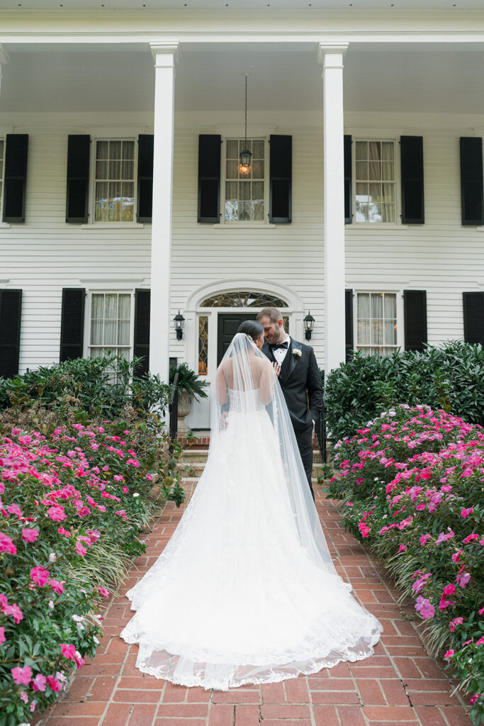 groom kissing the bride on the cheek