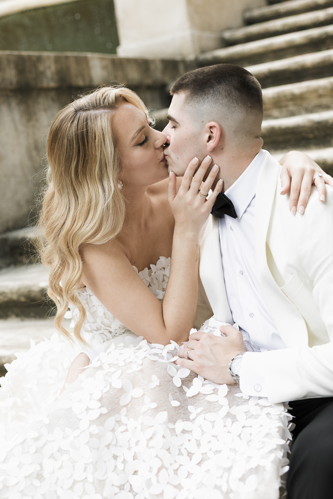 portrait of the newlyweds kissing 