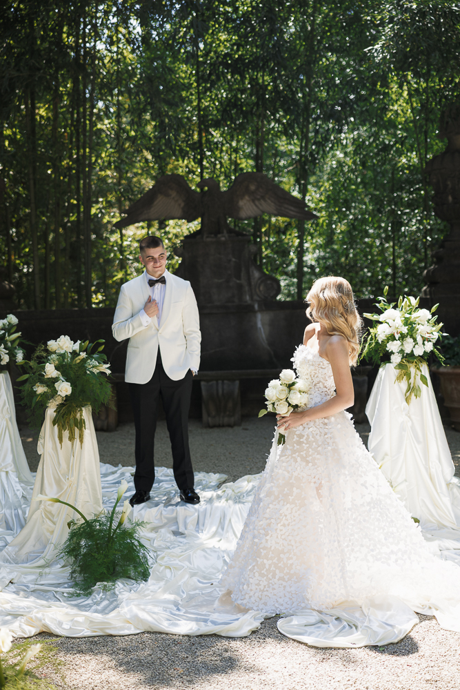 cute portrait of the bride and groom smiling at each other
