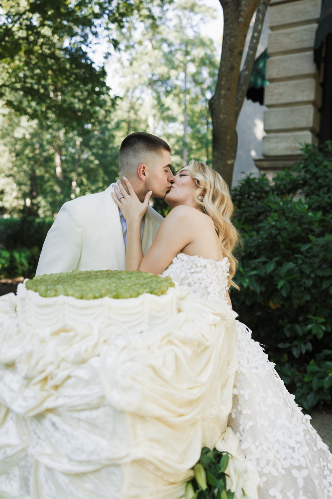 cute picture of the bride and groom kissing 