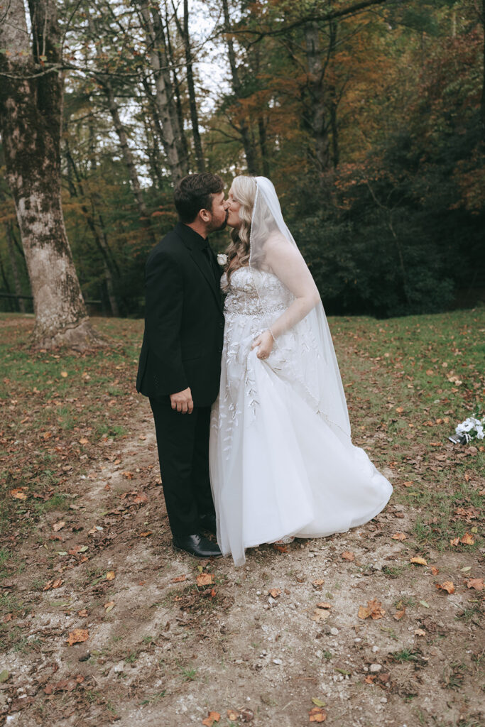 cute picture of the newlyweds kissing