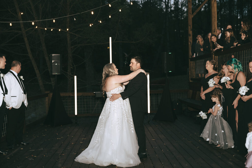 cute couple dancing at their reception party