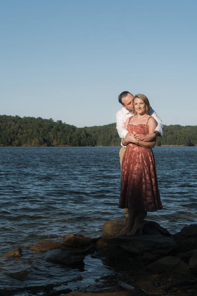 Fiancé, kissing his fiancé on the cheek