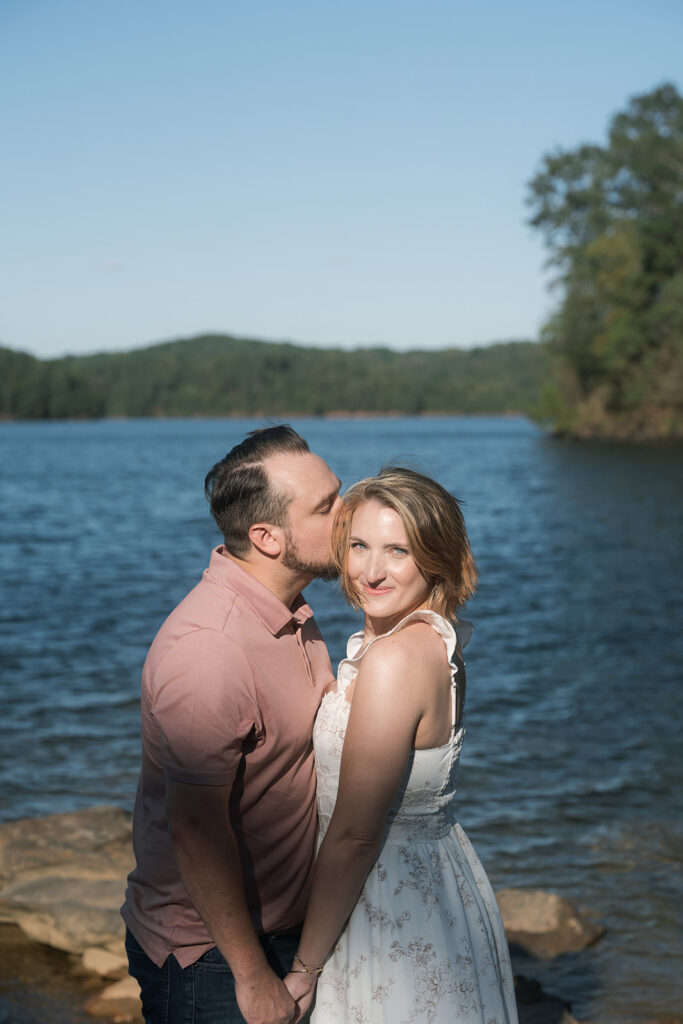 Fiancé, kissing his fiancé on the forehead