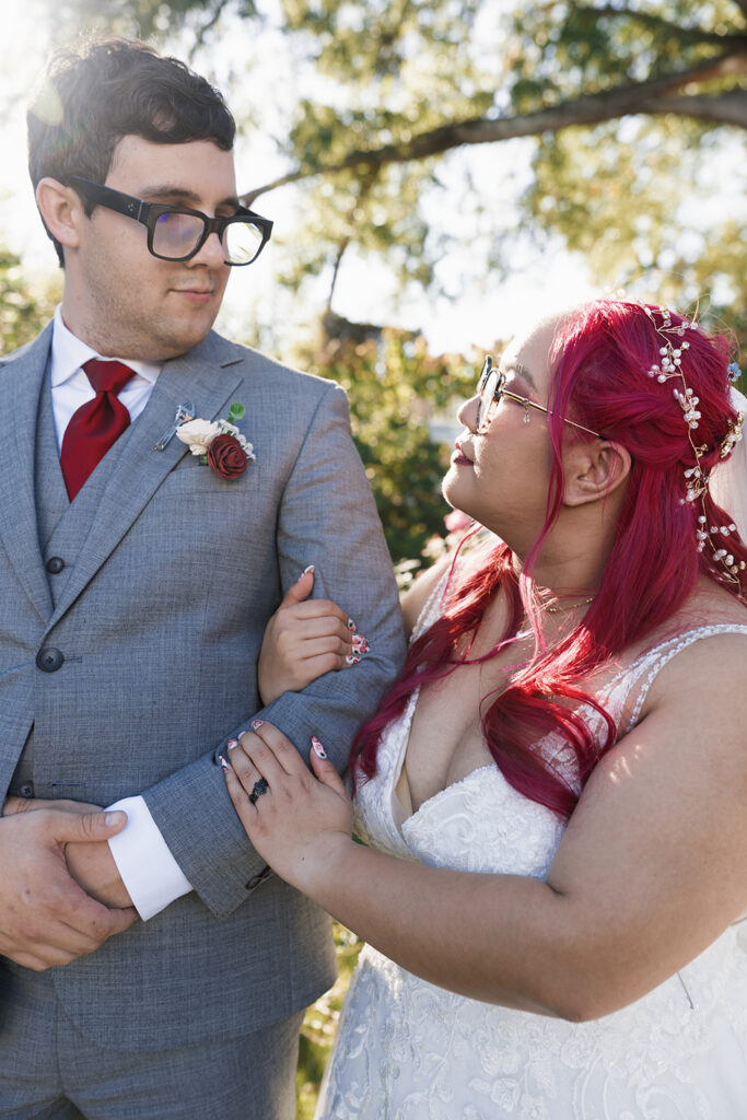 cute picture of the bride and groom smiling at each other