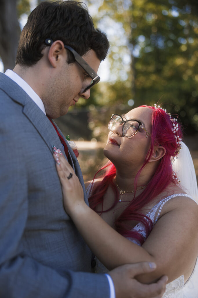 cute picture of the newlyweds smiling at each other