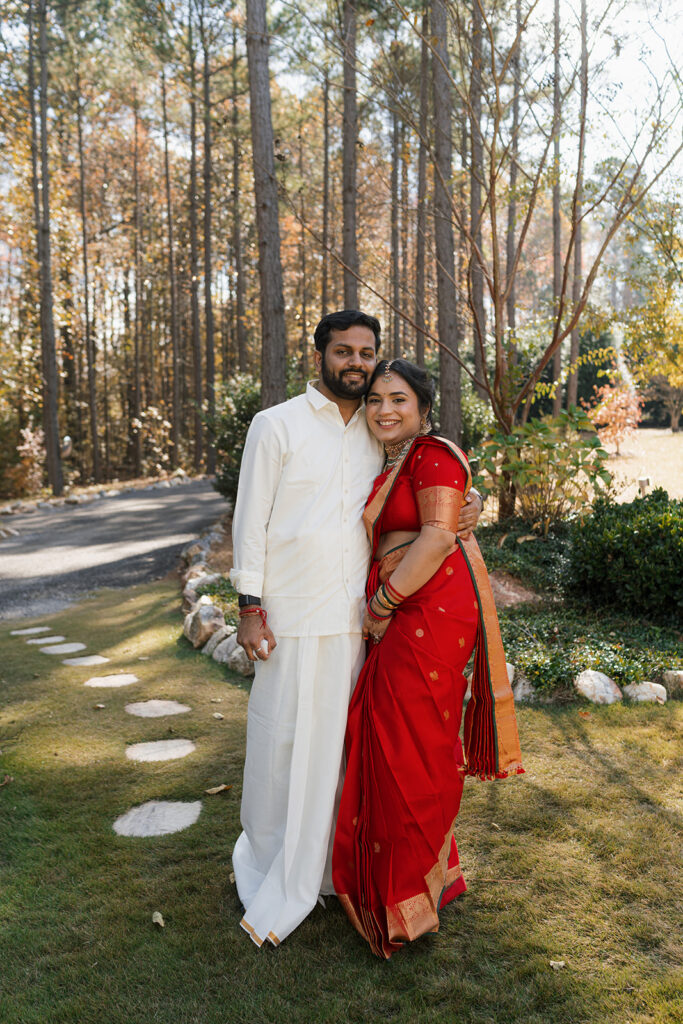 cute picture of the bride and groom smiling at the camera