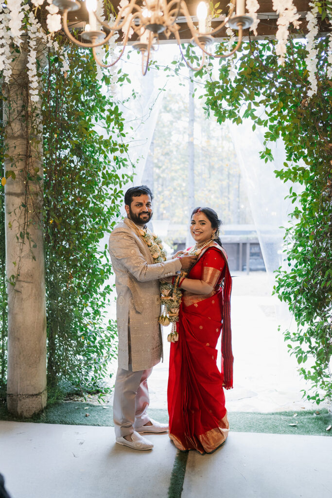 portrait of the newlyweds smiling at each other