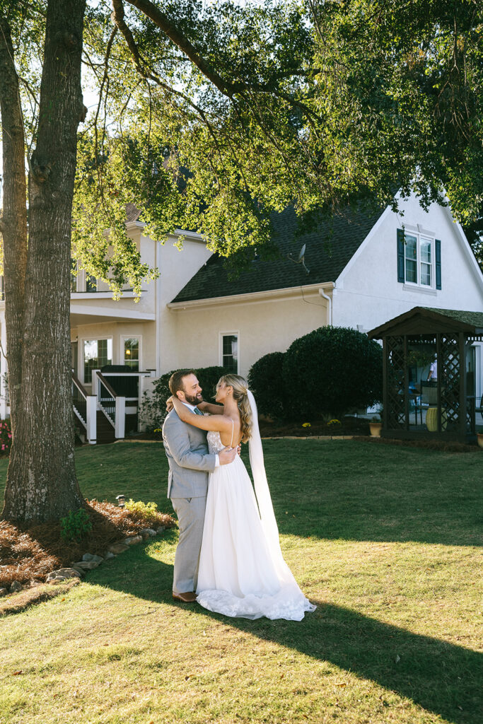 portrait of the bride and groom hugging