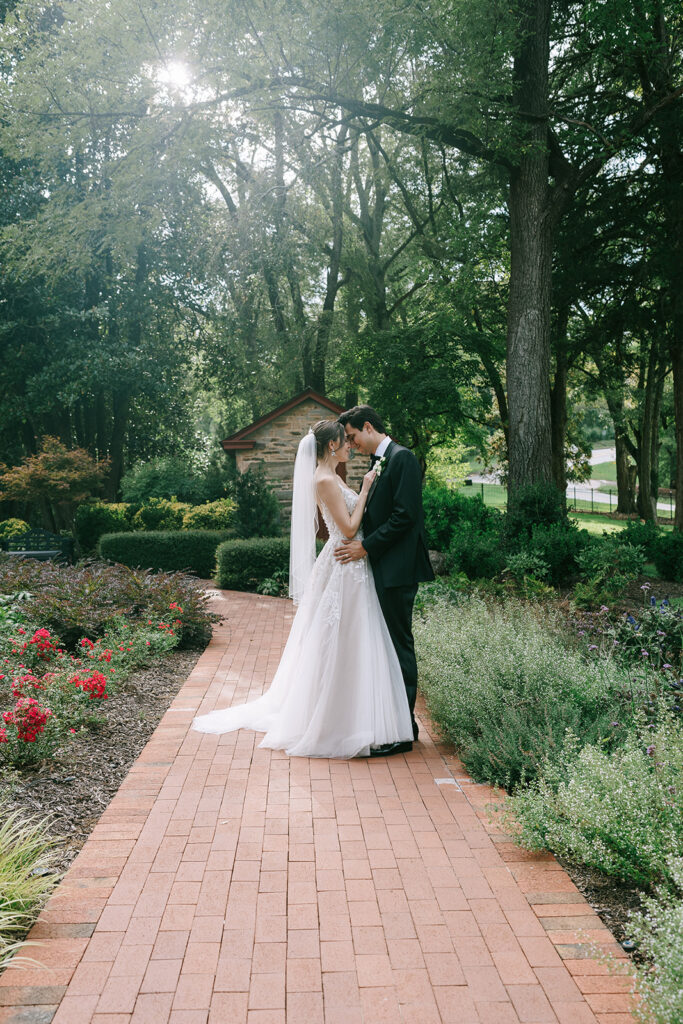 stunning portrait of the newlyweds kissing during their bridal session