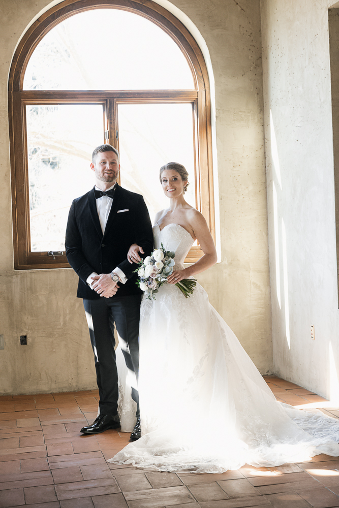 Portrait of the bride and groom before heading to their ceremony