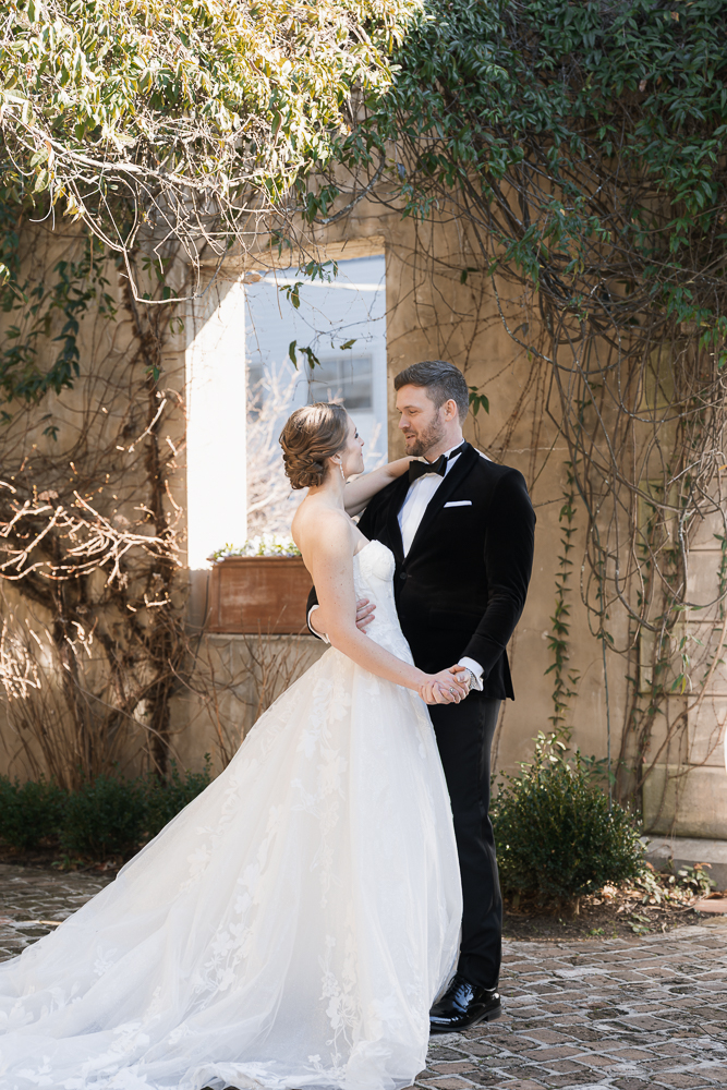 cute picture of the bride and groom smiling at each other