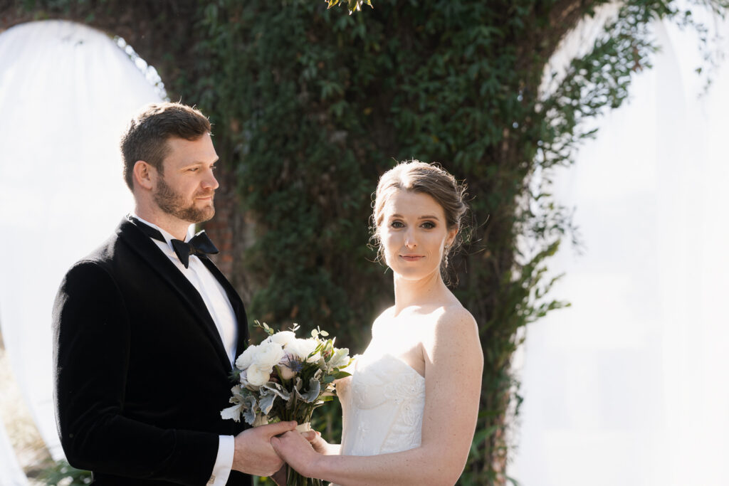 cute portrait of the groom watching the bride