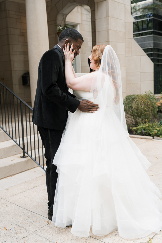 cute picture of the bride and groom smiling at each other