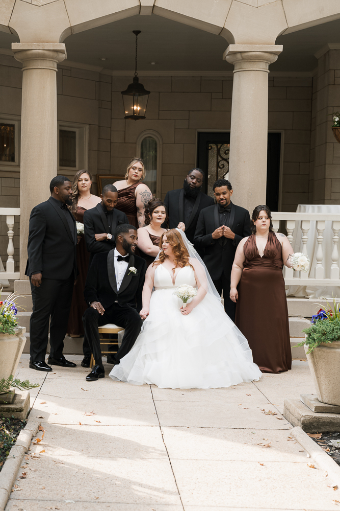 cute picture of the bride and groom with their bridal parties