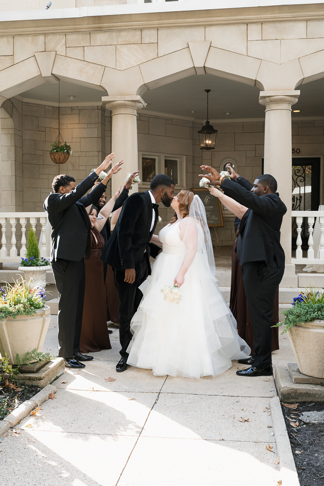 cute picture of the bride and groom with their friends