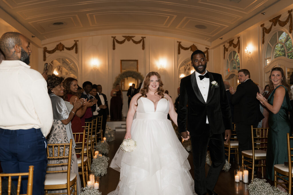 cute picture of the newlyweds heading to their wedding reception