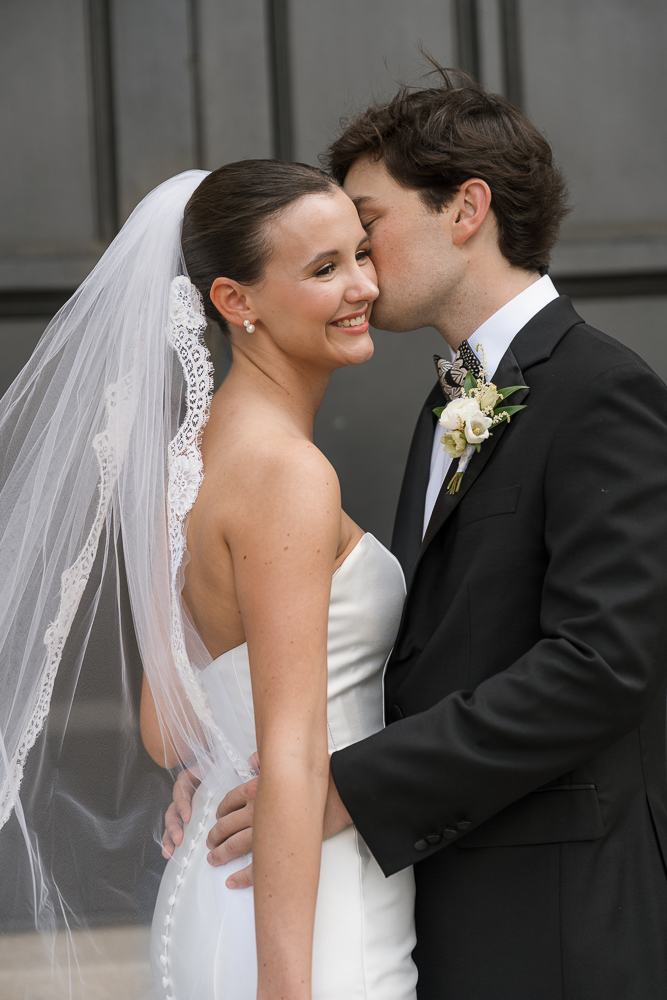cute picture of the bride and groom at their dream photoshoot