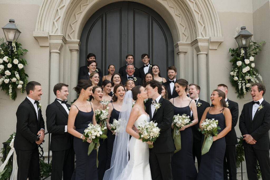 picture of the bride and groom with their bridal parties