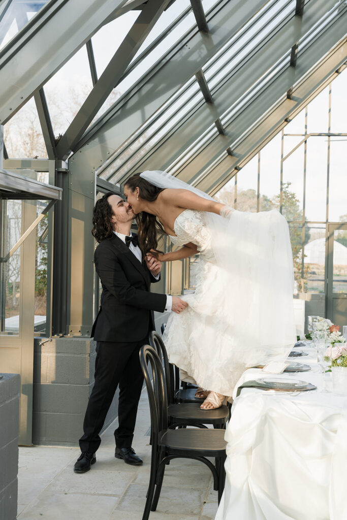 bride kissing the groom on the cheek