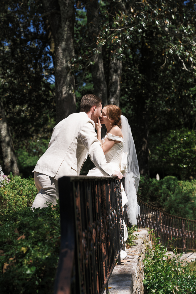 cute picture of the bride and groom kissing
