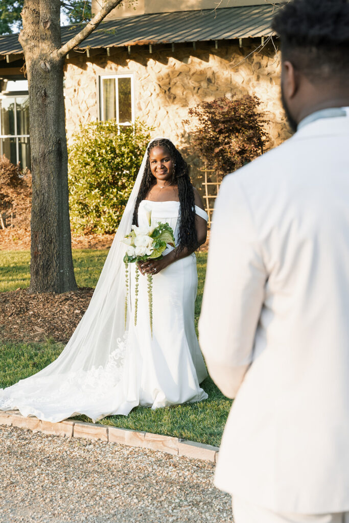 cute picture of the bride and groom smiling at each other