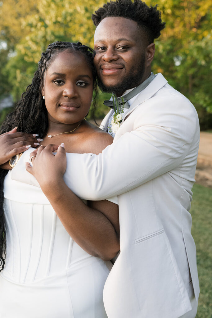 cute picture of the bride and groom hugging
